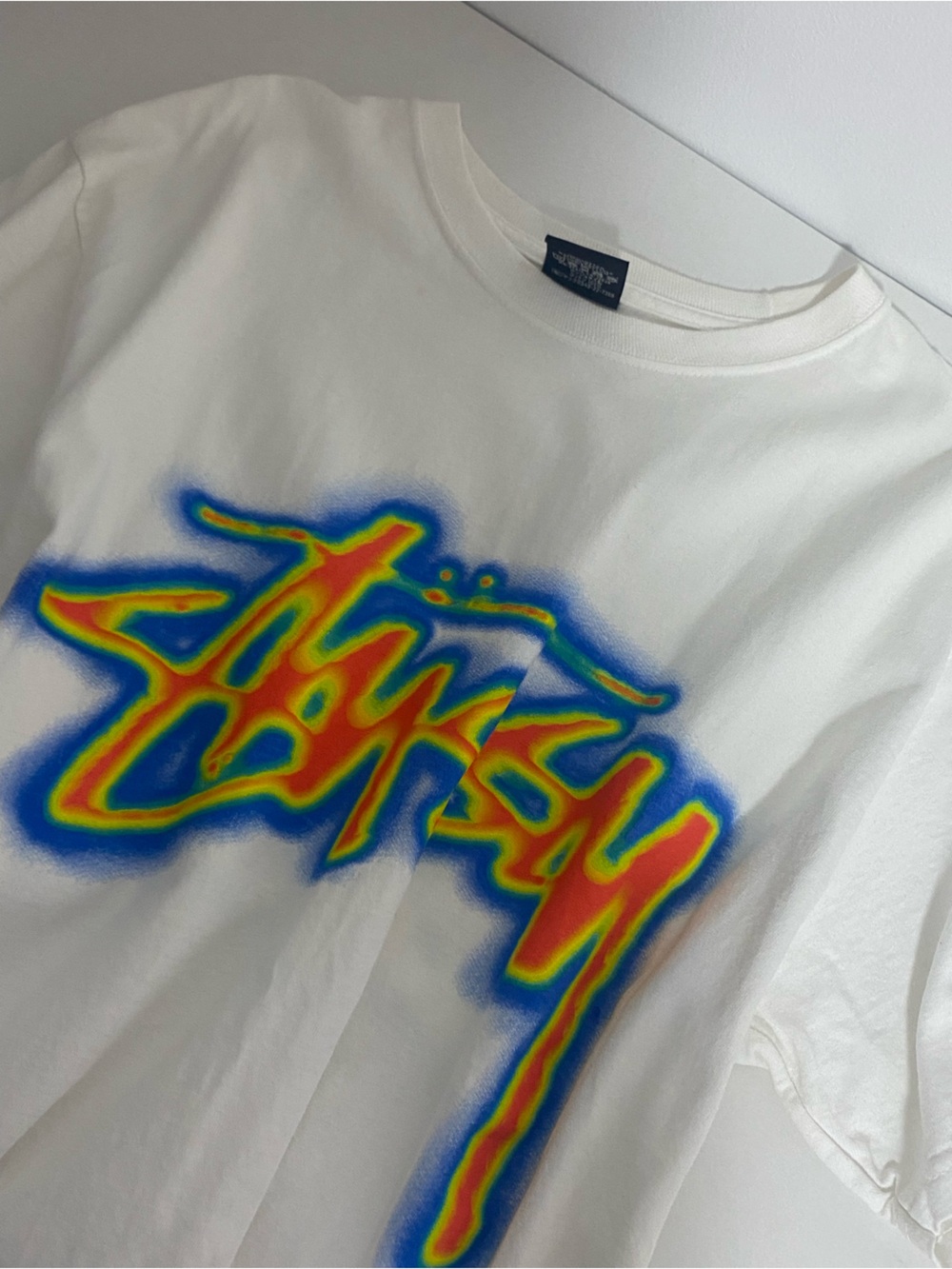 Stussy White Tee With Rainbow Logo Graphic Design